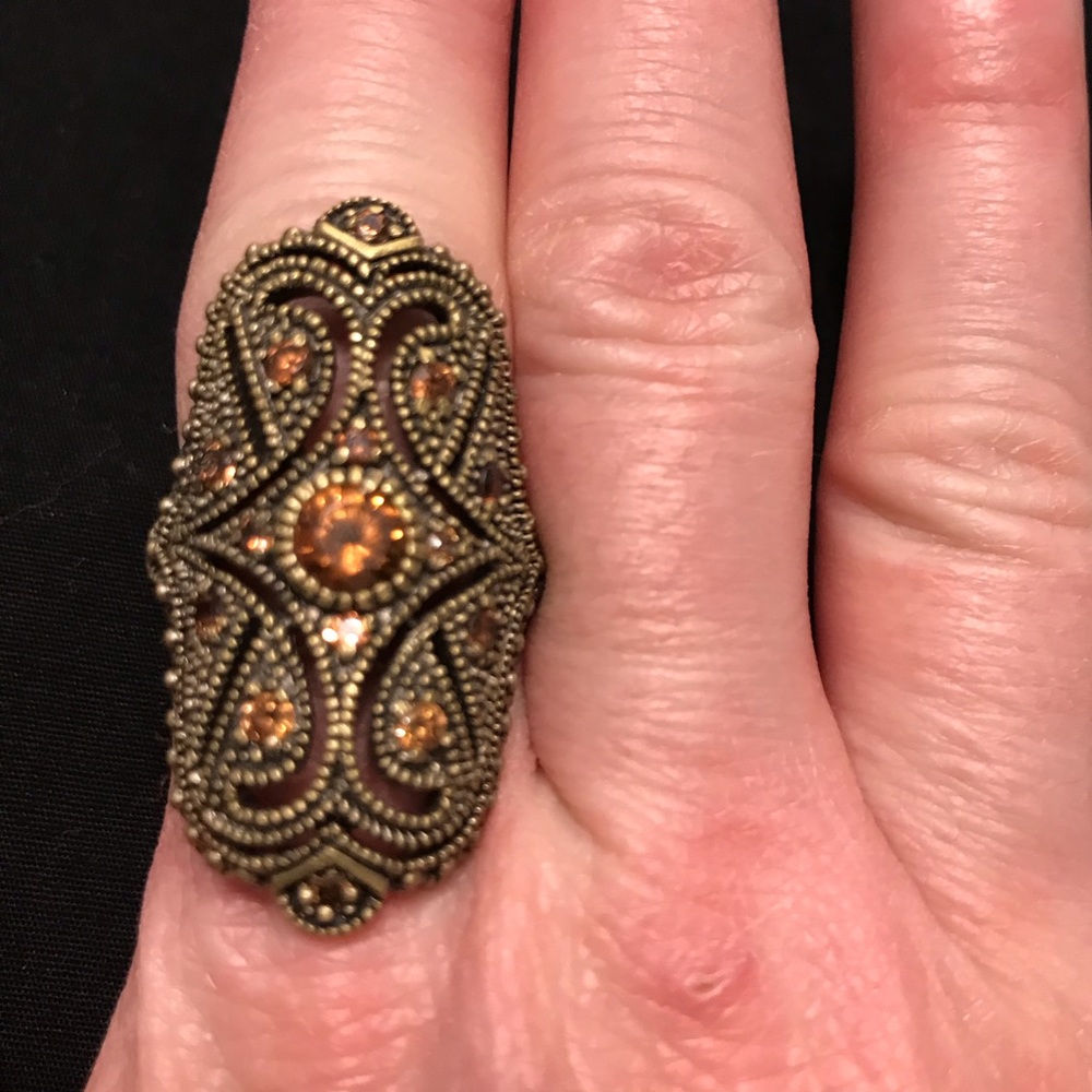 Bronze and amber colored stone ring